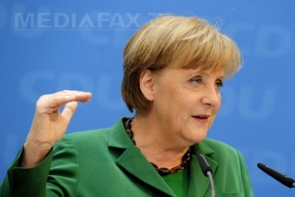 E sau nu Angela Merkel in fotografie? Imaginea cu cancelarul german face valva pe internet E sau nu Angela Merkel in fotografie? Imaginea cu cancelarul german face valva pe internet
