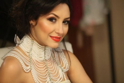 Andra: "Nu as mai purta asa ceva". Cu ce se imbraca vedeta la inceputul carierei - FOTO
