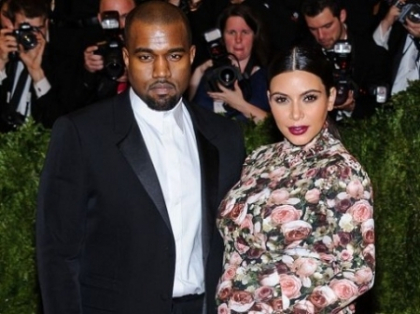 Insarcinata, dar nu renunta la tinutele senzuale. Kim Kardashian, intr-o bluza transparenta pe covorul rosu