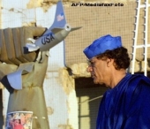 Surse: Muammar Ghaddafi se afla in Algeria. Un convoi de sase masini blindate l-a scos din Libia