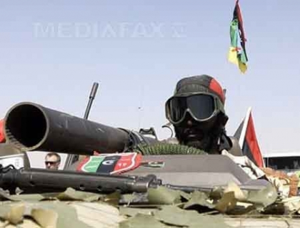 Confruntari intense in apropiere de unul dintre ultimele bastioane ale lui Muammar Gaddafi Confruntari intense in apropiere de unul dintre ultimele bastioane ale lui Muammar Gaddafi