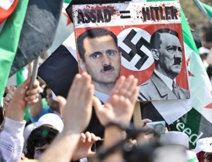 Aproape 4000 de oameni au manifestat la Casa Alba pentru ca SUA sa opreasca masacrul din Siria Aproape 4000 de oameni au manifestat la Casa Alba pentru ca SUA sa opreasca masacrul din Siria