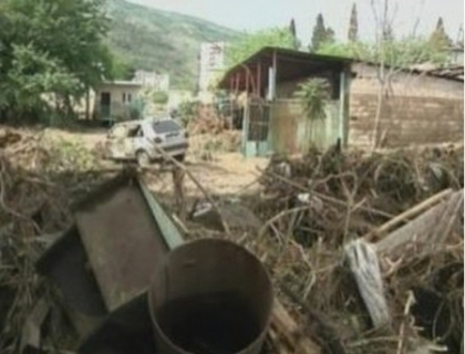 Loviti de furia naturii. Georgia si China lupta cu inundatiile Loviti de furia naturii. Georgia si China lupta cu inundatiile