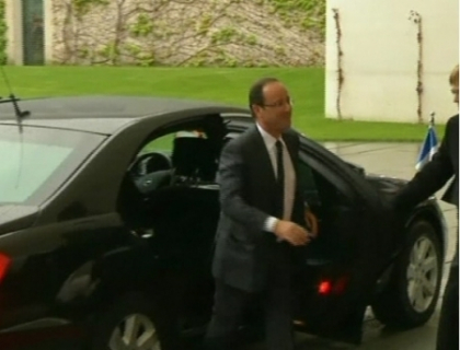 Angela Merkel si Francois Hollande, dupa discutii in contradictoriu: Grecia trebuie sa ramana in Zona Euro