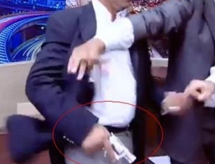 Scene incredibile intr-o emisiune din Iordania. Un invitat si-a amenintat adversarul politic cu arma