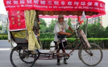 Lungul drum spre Jocurile Olimpice. Un chinez a parcurs 60.000 de km in ricsa, pana la Londra