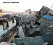 Case distruse, obuze si frica: prima zi de razboi coreean, in fotografii!