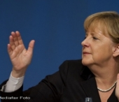 Angela Merkel apara moneda euro, pe care o considera mai puternica decat marca, fosta moneda germana Angela Merkel apara moneda euro, pe care o considera mai puternica decat marca, fosta moneda germana