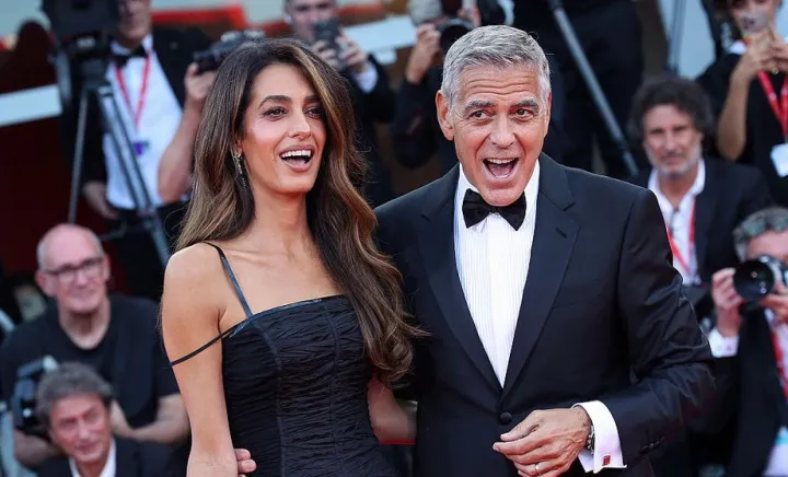 George Clooney și soția sa George Clooney și soția sa