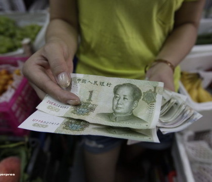 "Depreciere exceptionala". Banca Centrala a Chinei a devaluat yuanul la cel mai redus nivel fata de dolar din ultimii 3 ani