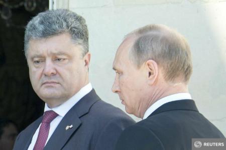 Putin si Porosenko au vorbit la telefon. Tancuri rusesti, infiltrate pe teritoriul Ucrainei