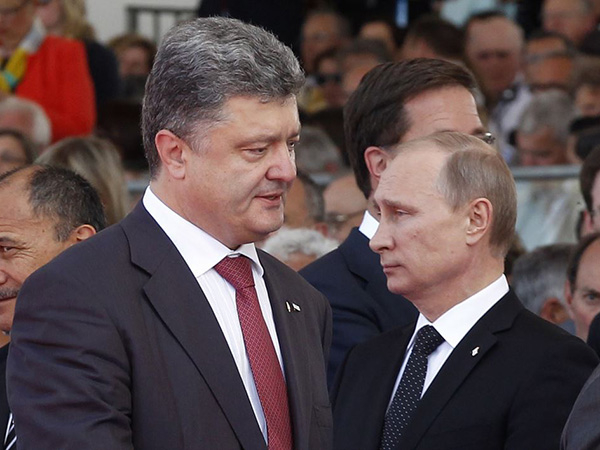 Armistitiu intre Putin si Porosenko? Conditiile de incetare a focului in Ucraina. Ce au discutat