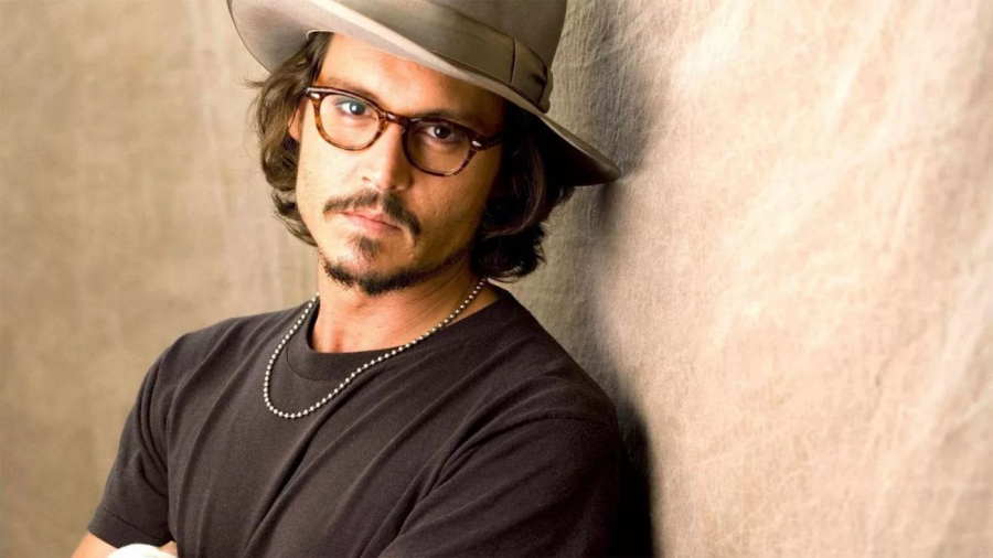 Johnny Depp - parasit de iubita cu 32 de ani mai tanara. Care este motivul