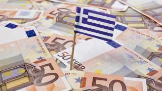 Cel mai lung si mai tensionat euro-summit. Dupa 17 ore de negocieri, liderii UE s-au inteles cu Tsipras: "Avem un ACORD!"