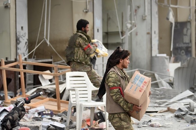 Rebelii sirieni aliati cu Turcia au jefuit orasul Afrin - GALERIE FOTO