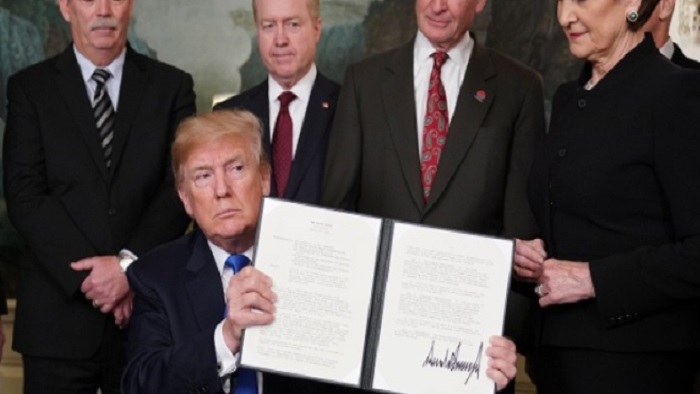 Donald Trump impune taxe vamale suplimentare importurilor din China. Reactia Beijingului